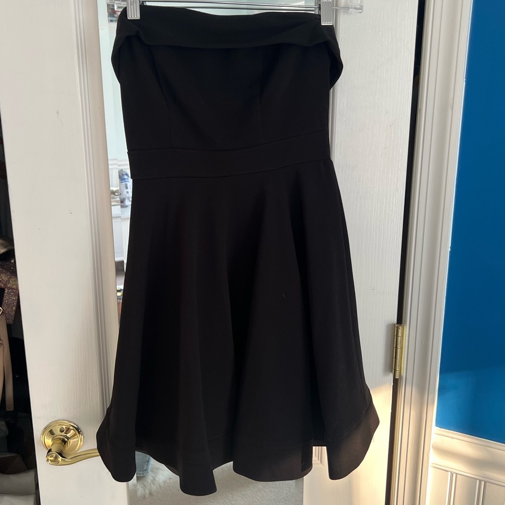Strapless black mini dress with full skirt